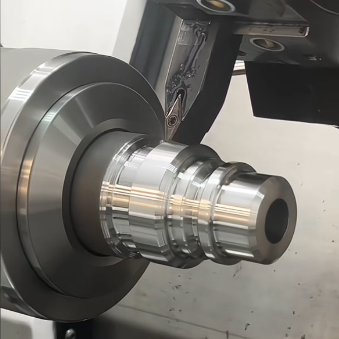 CNC turning machine producing precision turned parts